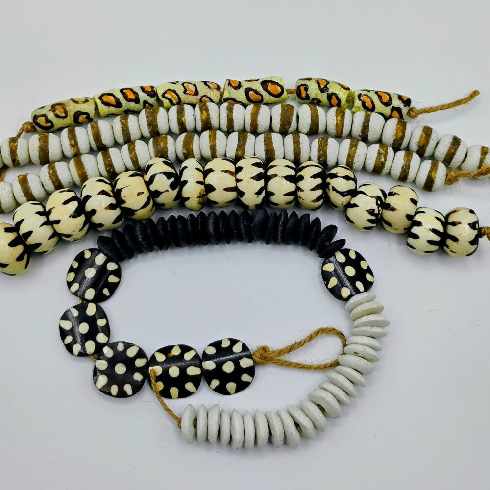 Detash beads lot: Black, white and orange cheetah focal bead lot